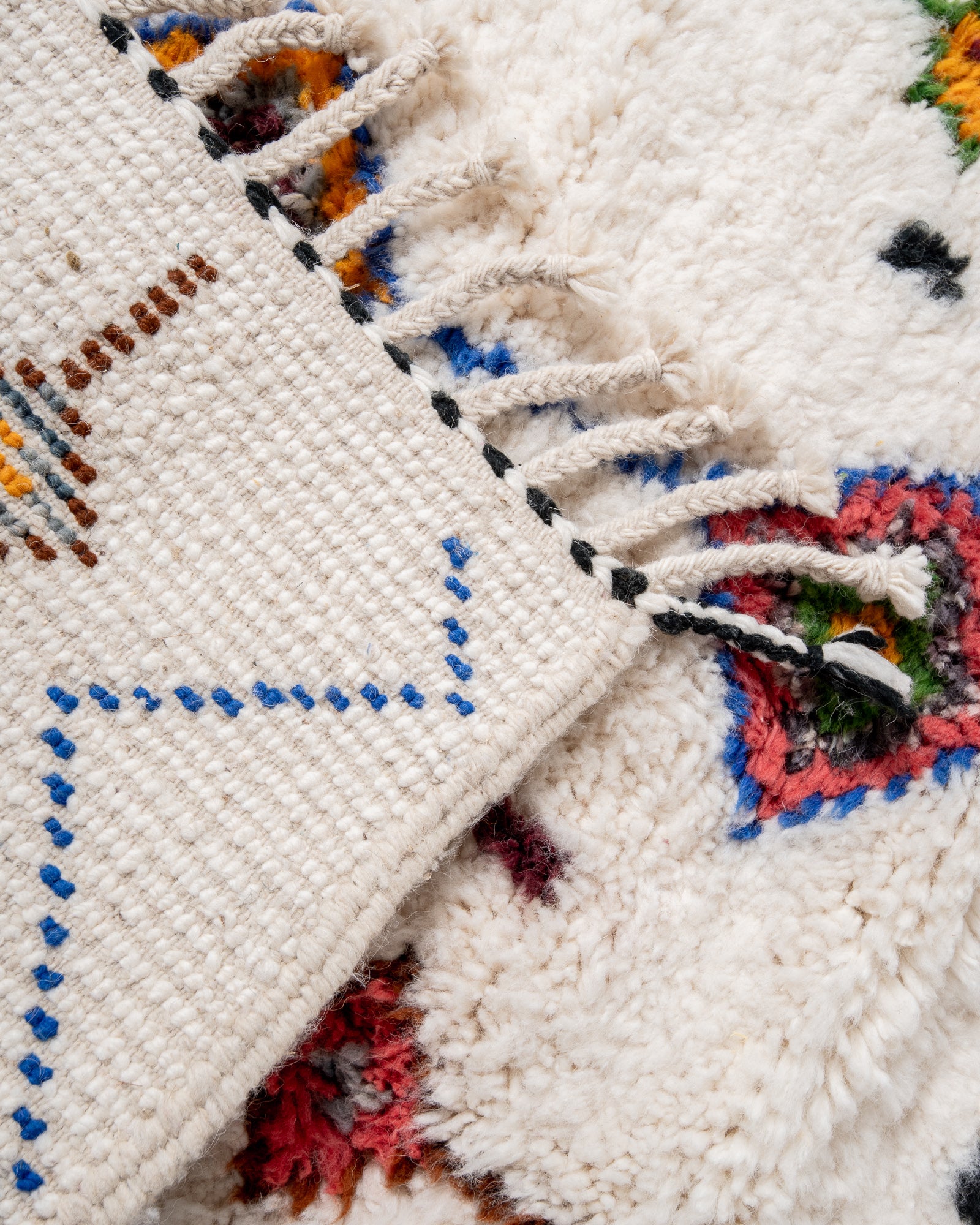 Modern, designer, handcrafted Berber rug from Morocco. Beniourain carpet with beautiful colours and patterns and fluffy wool texture.